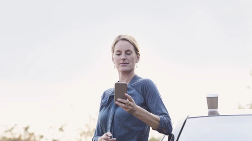 women holding phone