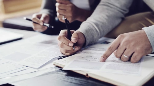 People doing paperwork