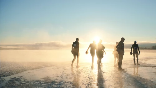 people standing on ice